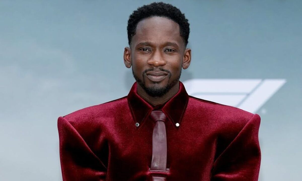 Mr Eazi Steals the Show in Burgundy Velvet